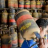 a worker carries an lpg cylinder in maharashtras thane amid concerns about a shortage of petroleum 094330594 16x9 1